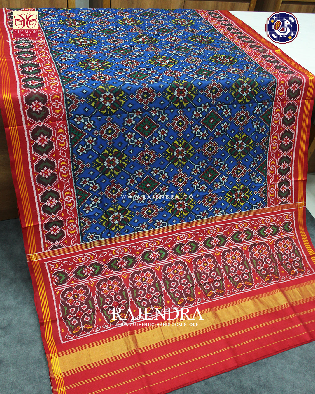 Traditional Navratna Design Red and Blue Ikat Patola Saree