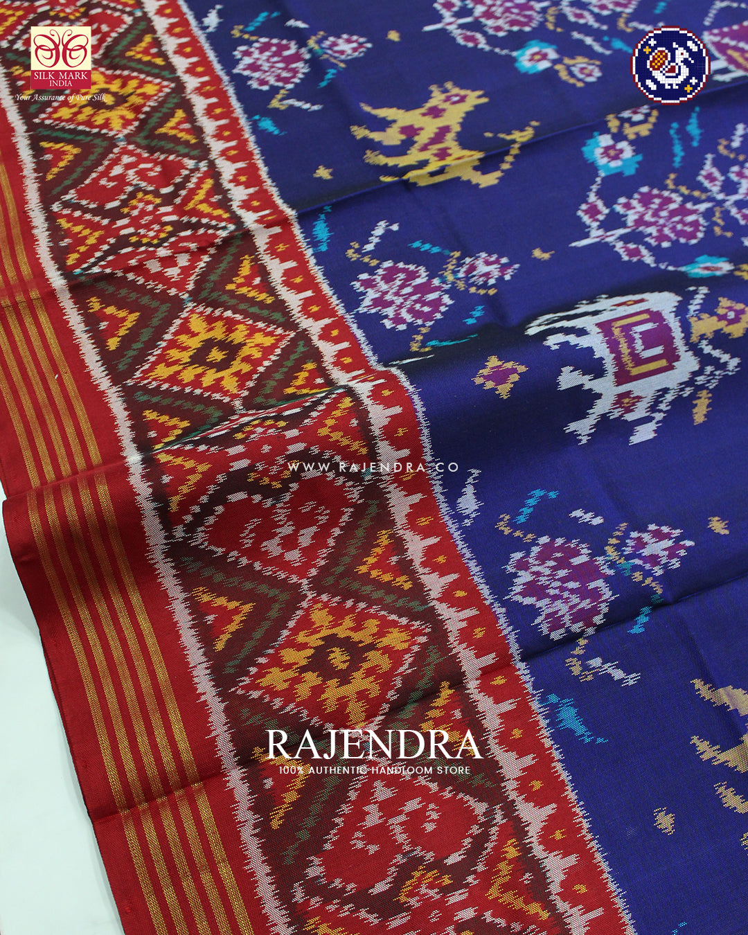 Exclusive 6 Figure Red and Blue Ikat Rajkot Patola Saree
