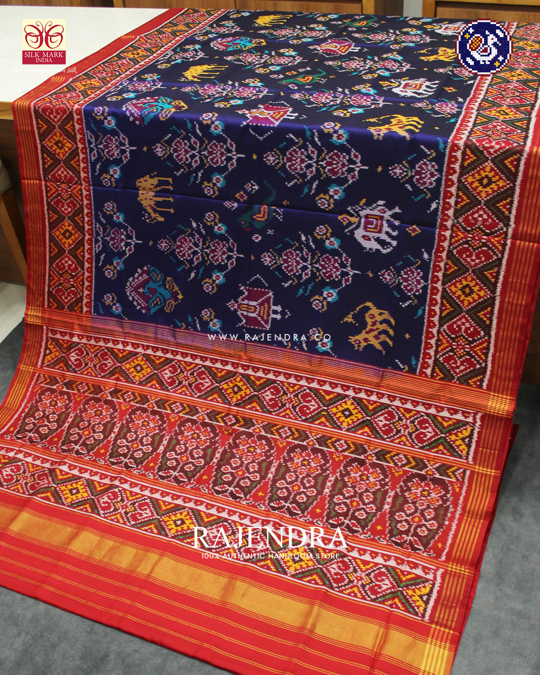 Exclusive 6 Figure Red and Blue Ikat Rajkot Patola Saree