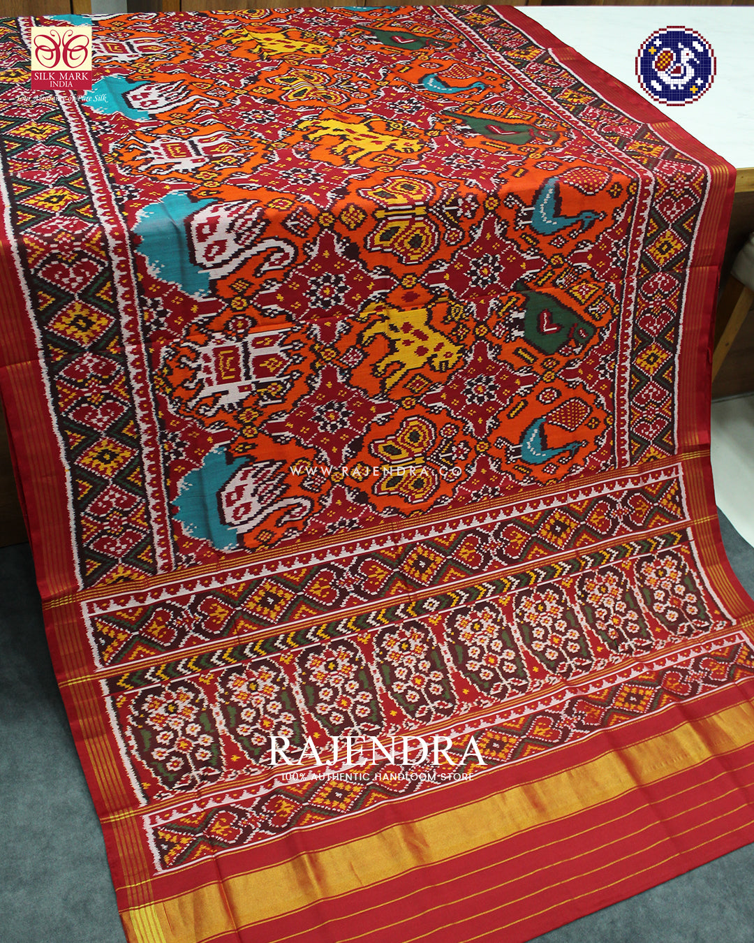 Exclusive 6 Figure Red and Orange Ikat Rajkot Patola Saree