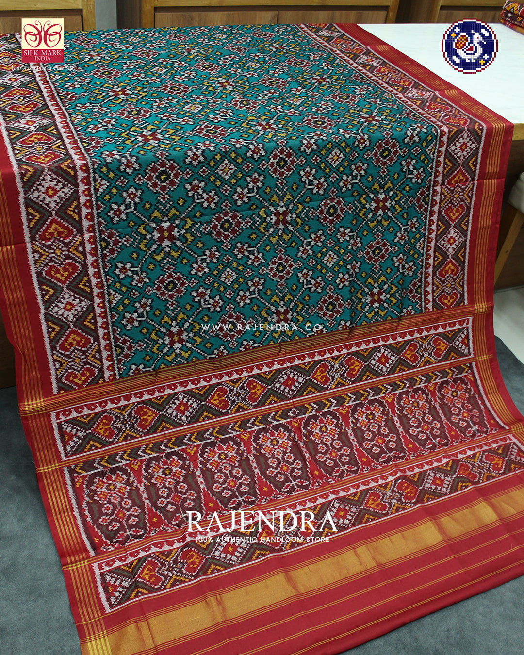 Traditional Navratna Design Red and Sea Green Ikat Rajkot Patola Saree