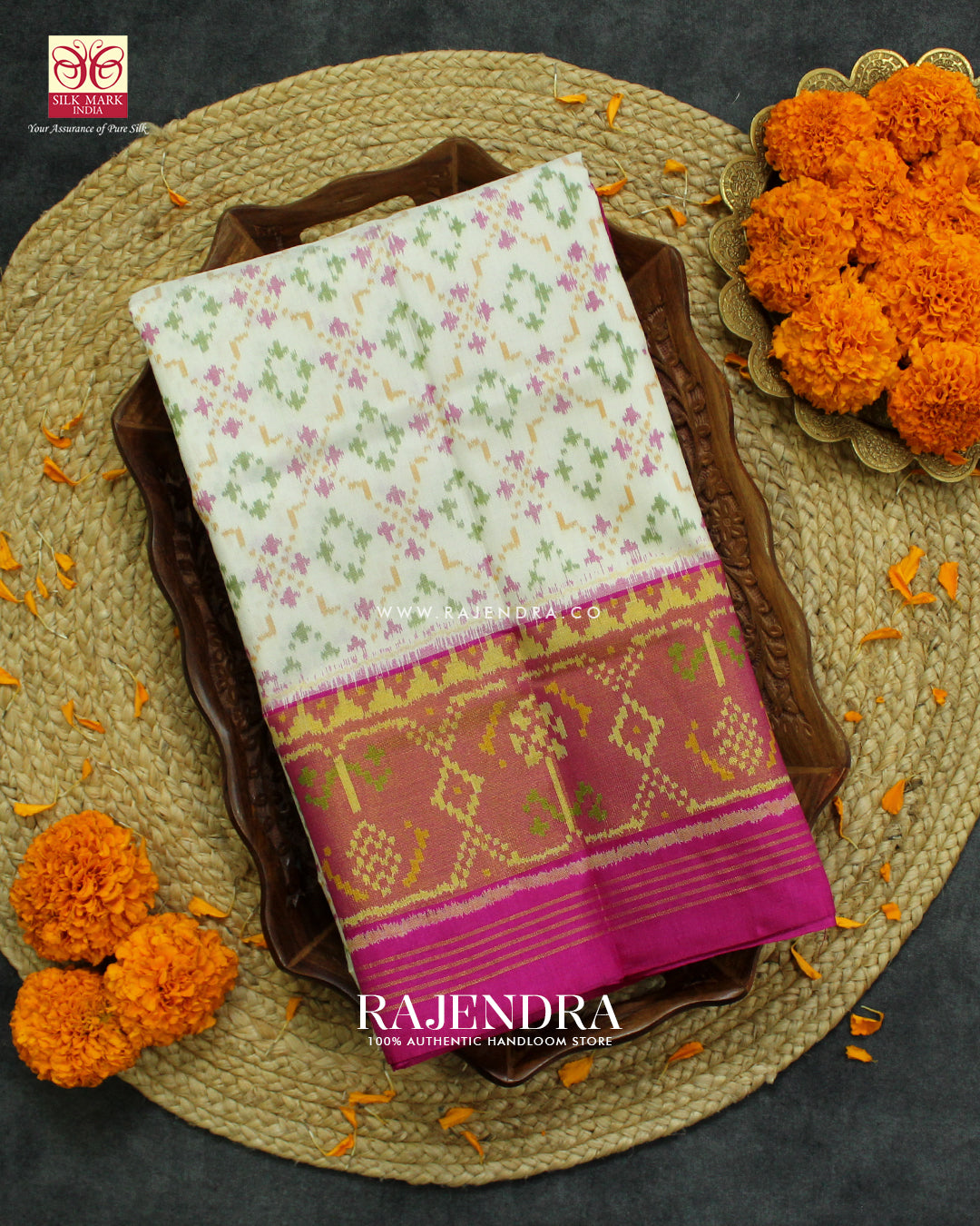 Traditional Buttonful Design Pin and White Rajkot Patola Saree