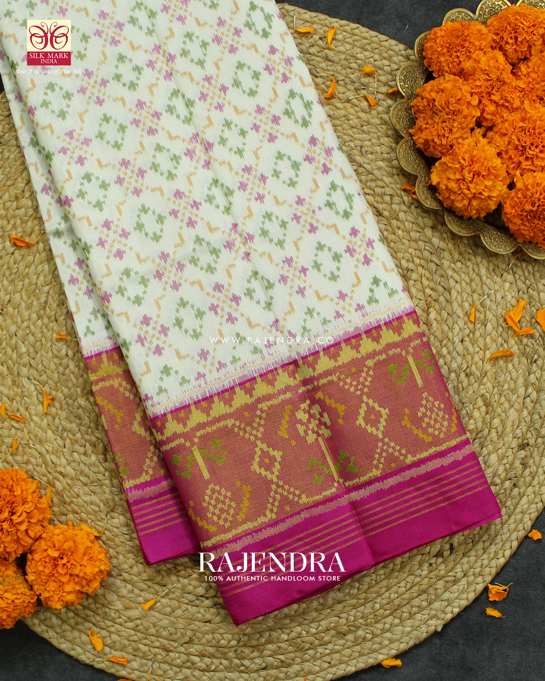 Traditional Buttonful Design Pin and White Rajkot Patola Saree