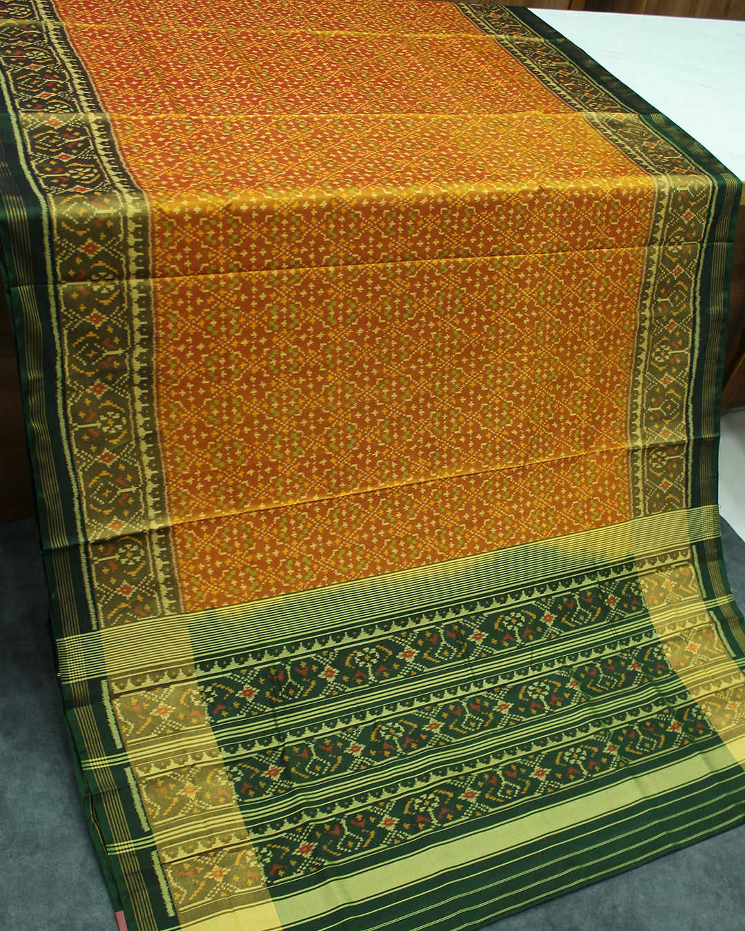 Traditional Buttonful Design Green Mustard Rajkot Patola Saree