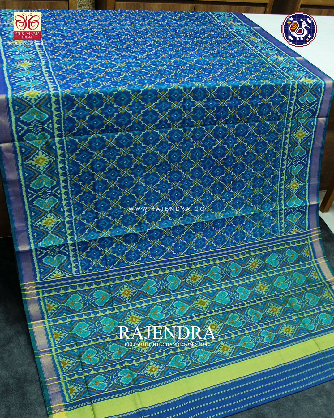 Traditional Buttonful Design Light Blue Rajkot Patola Saree