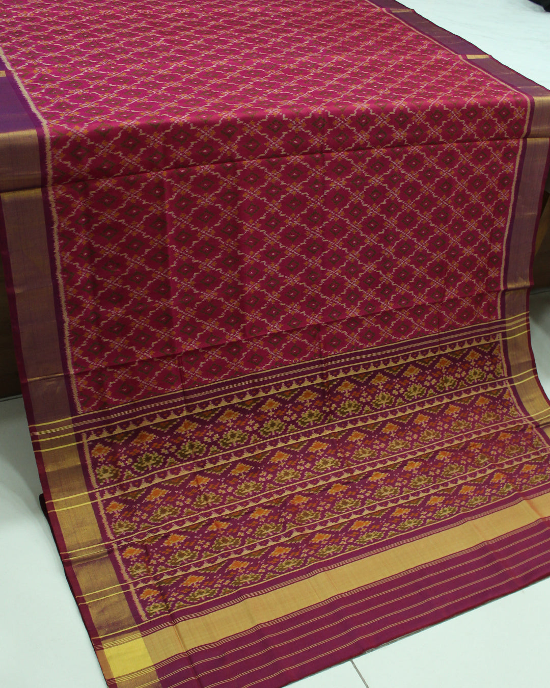 Traditional Buttonful Design Pink and Purple Rajkot Patola Saree