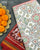 Traditional Navratna Design White Semi Double Ikat Rajkot Patola Saree