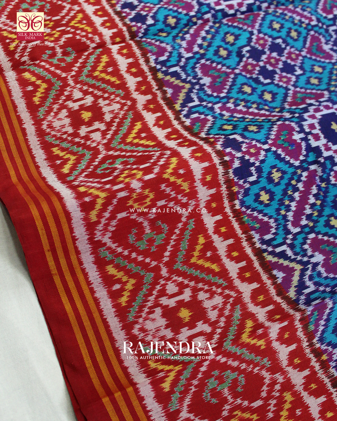 Traditional Manekchowk Design Red and Light Blue Ikat Rajkot Patola Saree