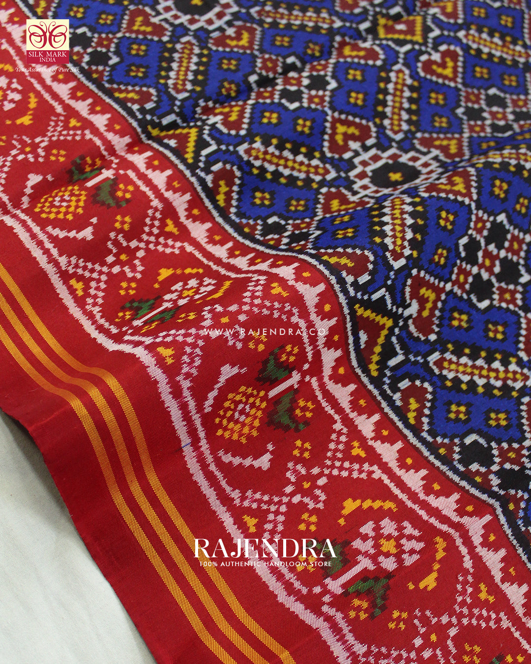 Traditional Manekchowk Design Red and Blue Ikat Rajkot Patola Saree