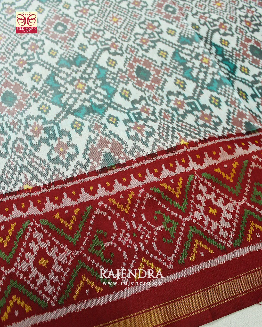 Traditional Navratna Bhat Red and White Single Ikat Rajkot Patola Saree