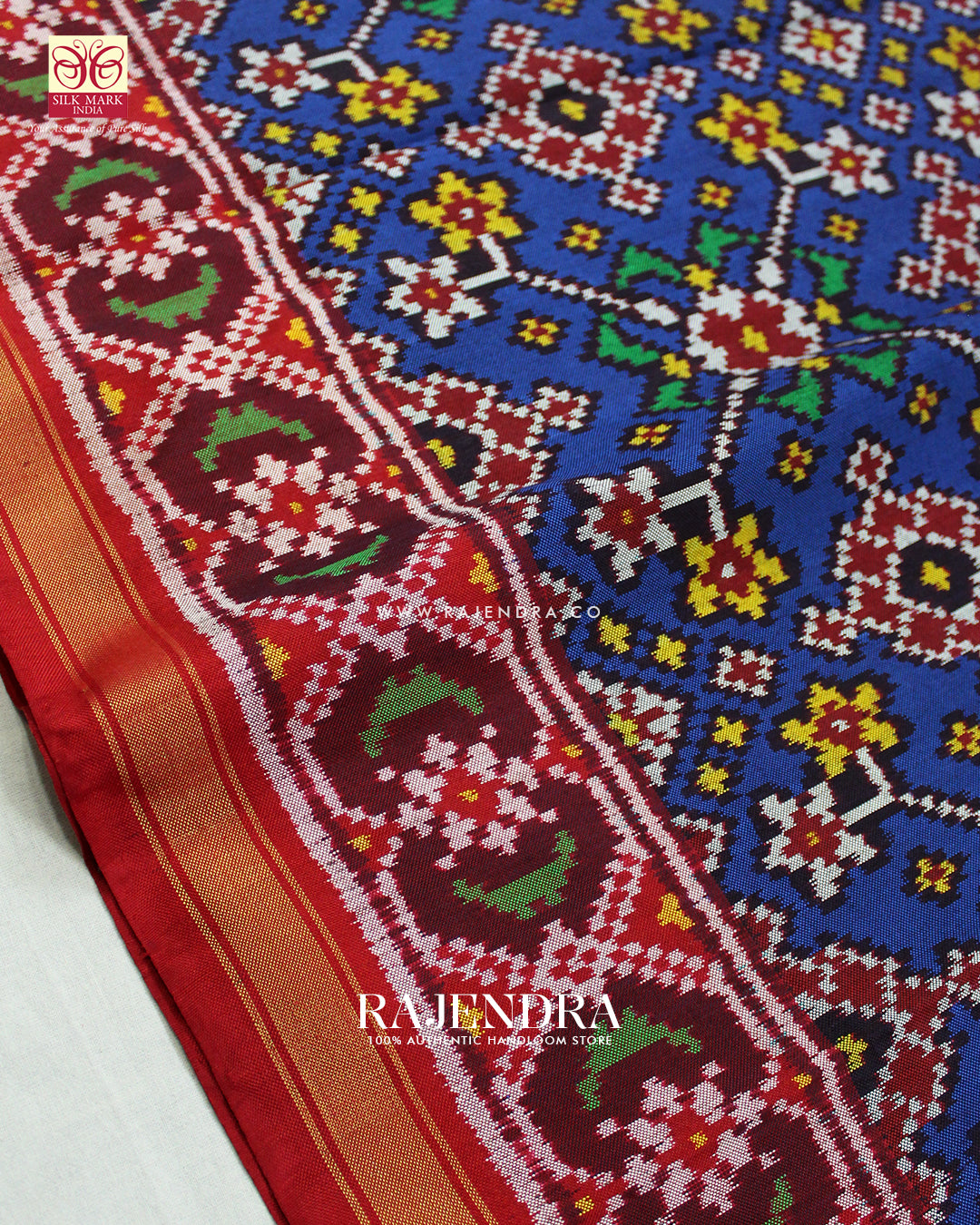 Traditional Navratna Design Red and Blue Ikat Rajkot Patola Saree