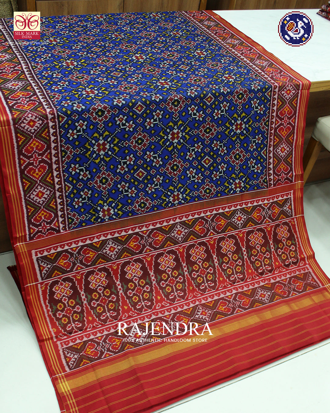 Traditional Navratna Design Red and Blue Ikat Rajkot Patola Saree