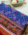 Exclusive Navratna Red and Blue Semi Double Ikat Rajkot Patola Saree