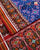 Exclusive Navratna Red and Blue Semi Double Ikat Rajkot Patola Saree