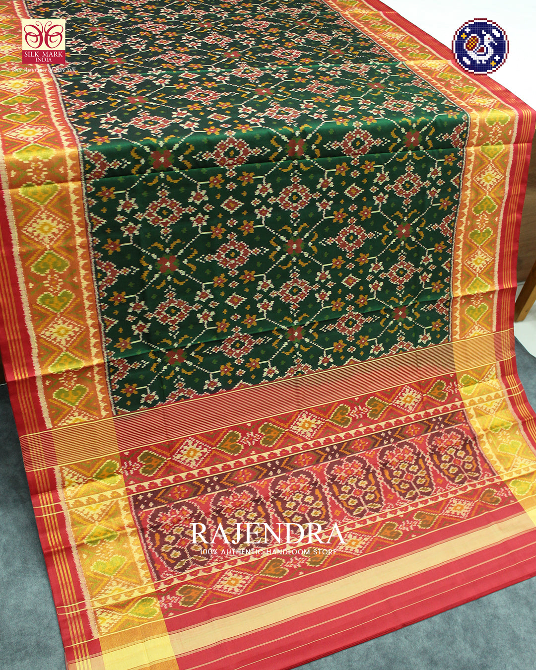 Traditional Navratna Design Red and Green Rajkot Patola Saree