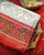 Traditional Navratna Design Red and White Semi Double Ikat Rajkot Patola Saree