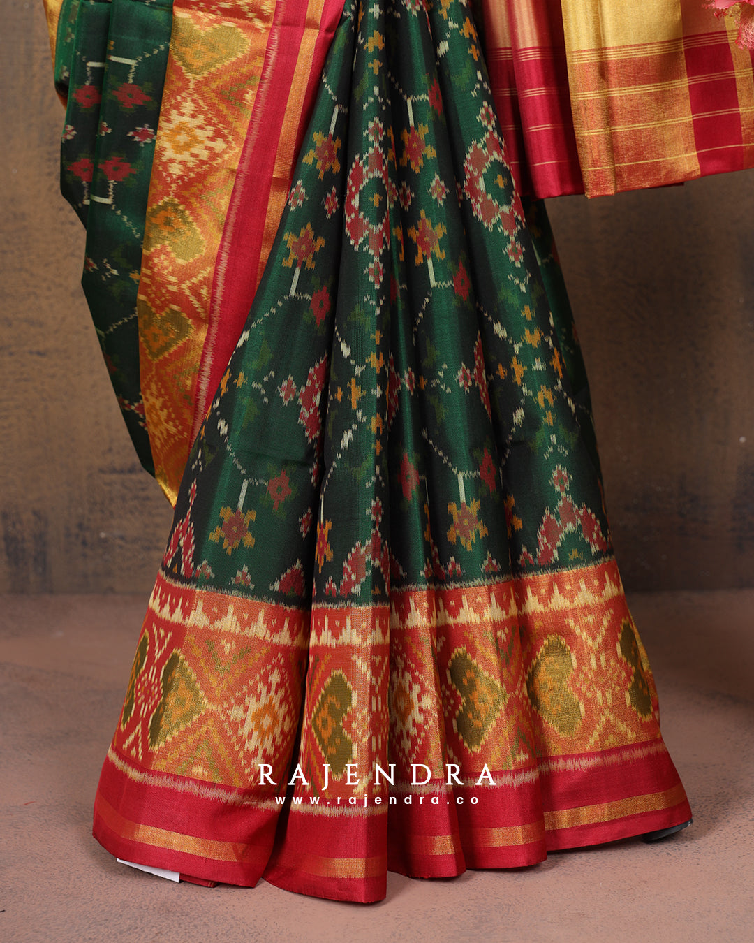 Traditional Navratna Bhat Red and Green Single Ikat Rajkot Patola Saree