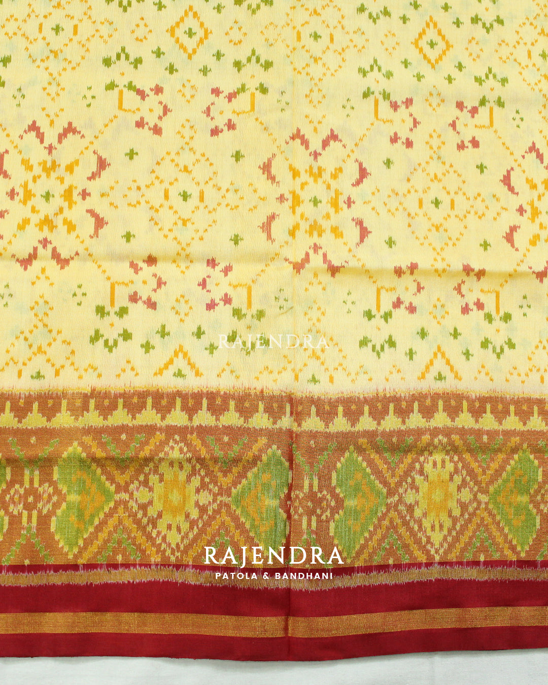 Traditional Navratna Bhat Red Off-White Single Ikat Rajkot Patola Saree