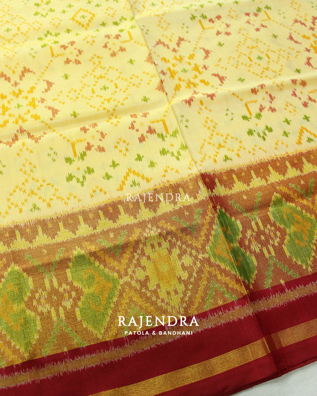 Traditional Navratna Bhat Red Off-White Single Ikat Rajkot Patola Saree