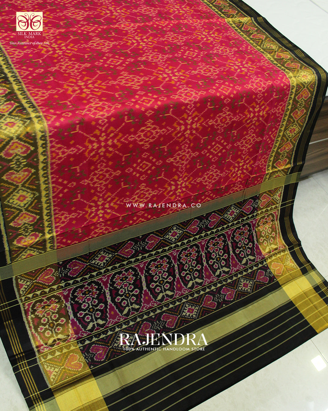 Traditional Navratna Design Peach Black Single Ikat Rajkot Patola Saree