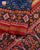 Traditional Navratna Bhat Red and Blue Semi Double Ikat Rajkot Patola Saree