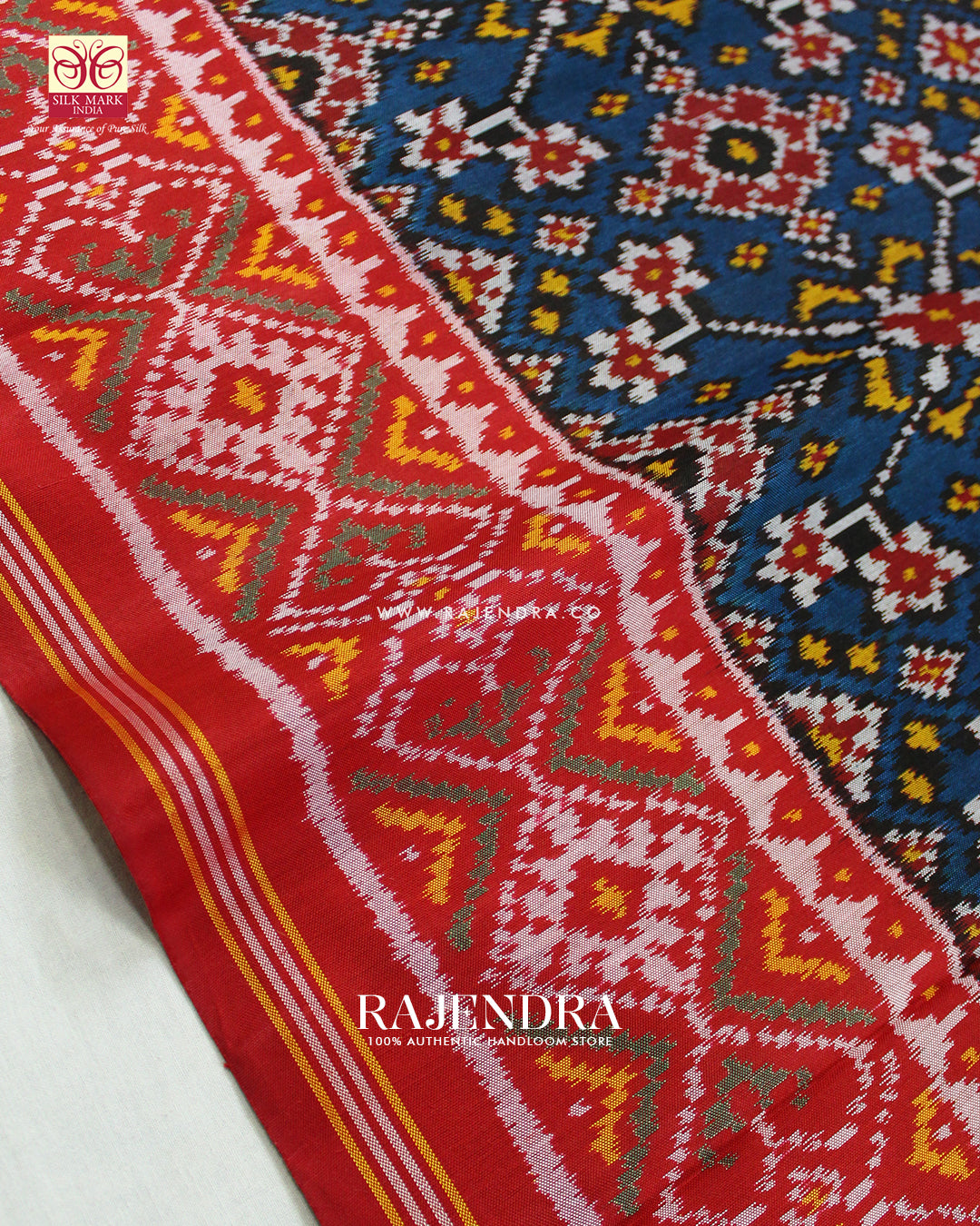 Traditional Navratna Design Red and Blue Ikat Rajkot Patola Saree