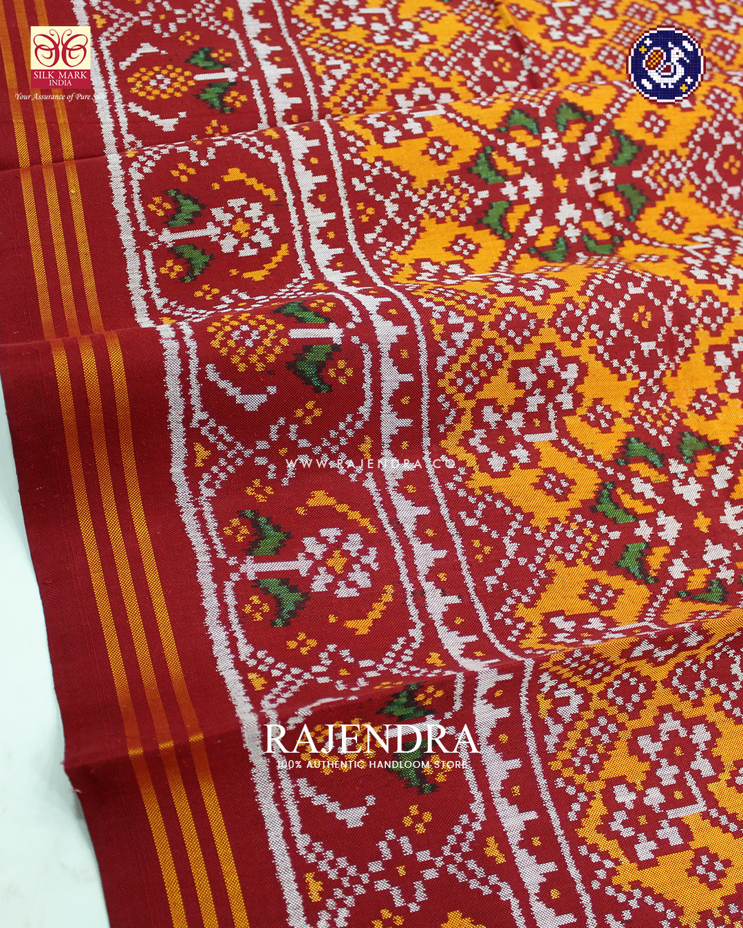 Traditional Navratna Design Red and Orange Ikat Rajkot Patola Saree